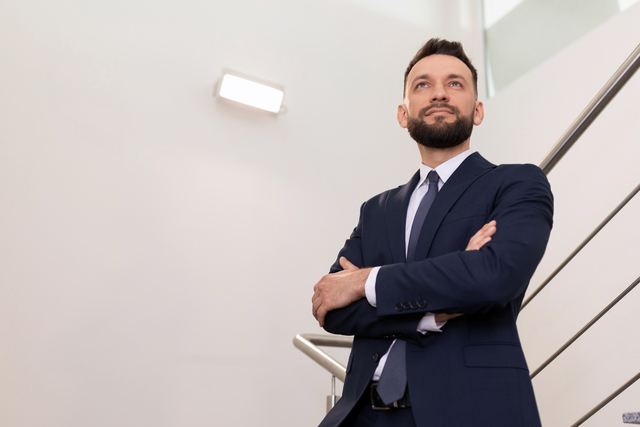 close-up business portrait of a male businessman, Business strategy concept - Kabat, Schertzer, De La Torre, Taraboulos & Co.